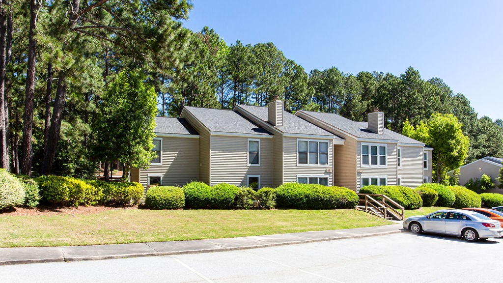 a house with a car parked in front of itat Hidden Lake, Union City, GA, 30291