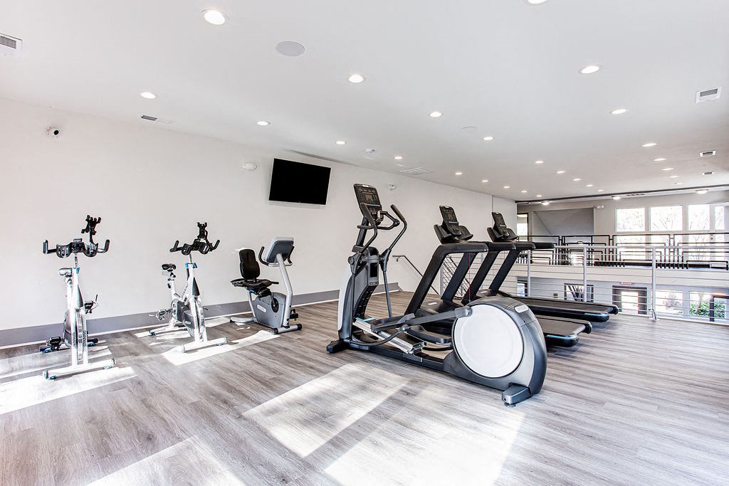 the gym at the flats at big tex apartments