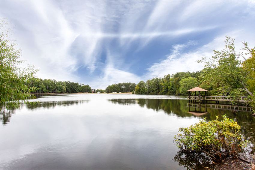 a view of a lake with a gazebo on it