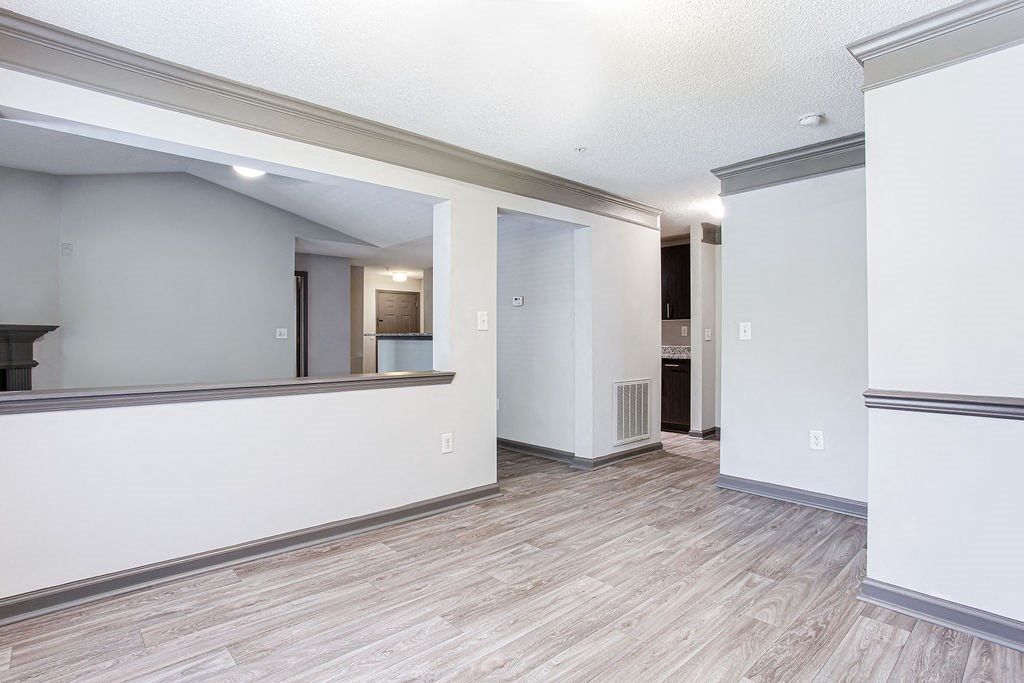 a bedroom with a large mirror