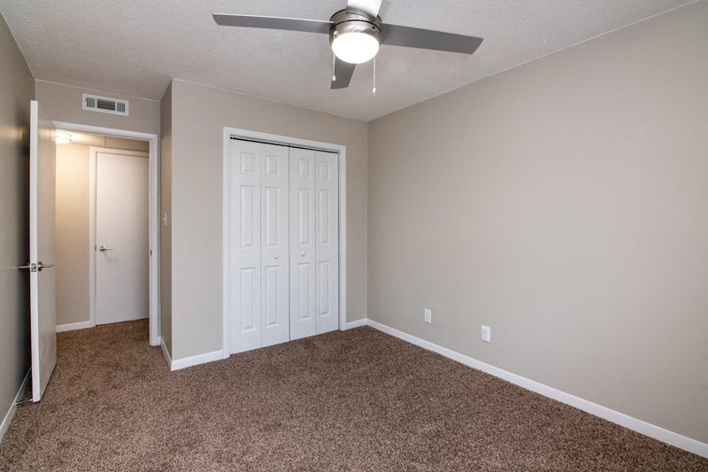 Room with wooden floors and window at The Cleo Apartments, Athens