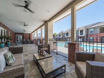 Shaded Lounge Area By Pool at Century Palm Bluff, Portland, TX, 78374 - Photo Gallery 8