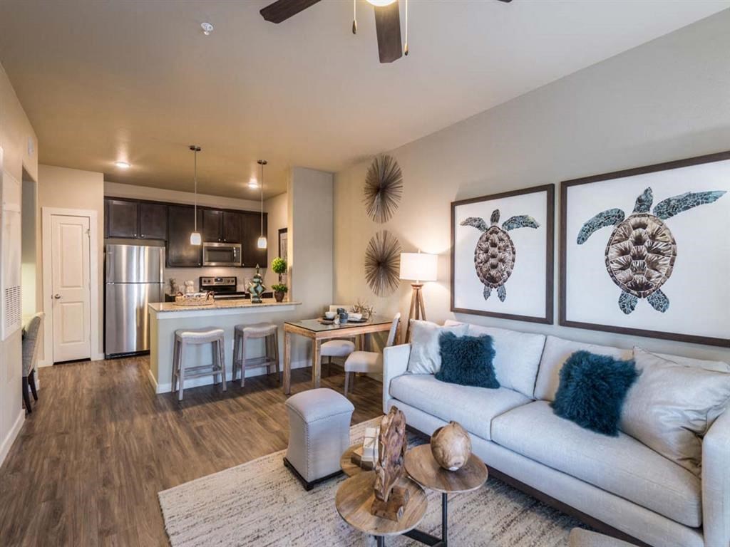 Living Room With Kitchen View at Century Palm Bluff, Portland