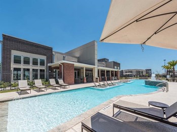 Swimming Pool Area With Shaded Chairs at Century Palm Bluff, Portland - Photo Gallery 21