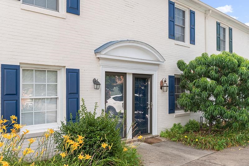 Apartment entrance featuring spacious windows at Barracks West apartments in Charlottsville, VA