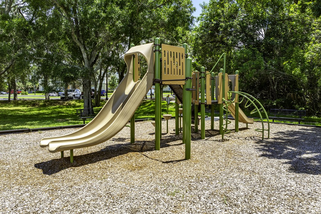 a slide on a playground in a park at Ventura at Turtle Creek, Rockledge, FL