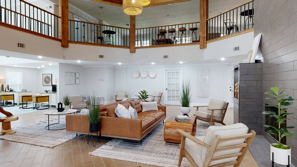 a living room with white walls and a high ceiling at Vinings RiverVue Apartments, Atlanta, GA, 30339