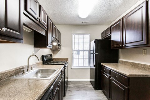 Black Appliances in Kitchen at Wildcreek Apartments, Clarkston, GA 30021