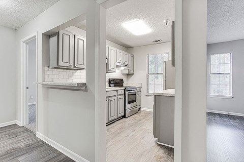 Kitchen And Hallway at Wildcreek Apartments, Clarkston, GA