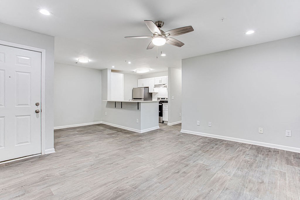 an open kitchen and living room at Wood Terrace, Doraville, 30340