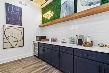 A kitchenette featuring coffee and tea