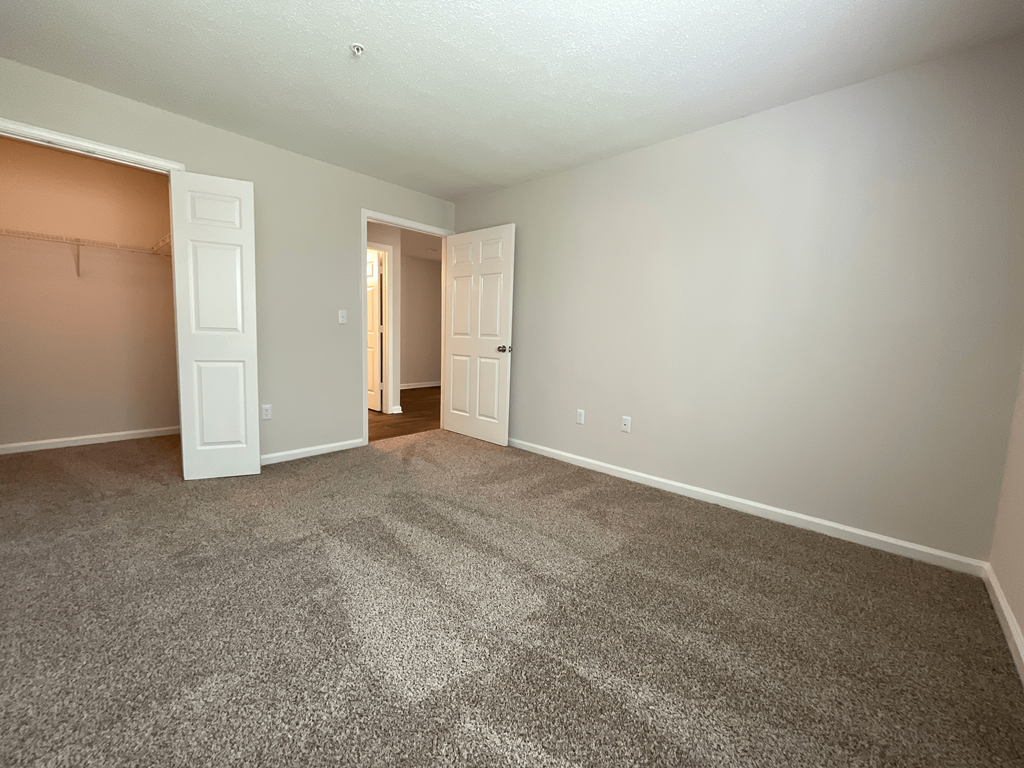 spacious bedroom with walk-in closet at Palmetto Place, South Carolina