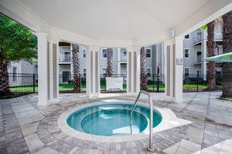 hot tub at the enclave at woodbridge apartments in sugar land, tx