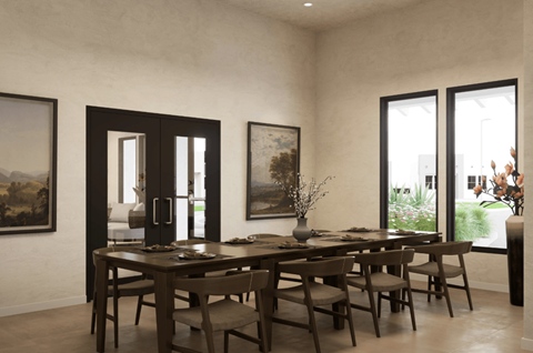 A dining room with a table set for six.