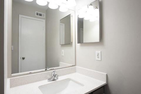 Bathroom with vanity and mirrorat Enclave at Roswell, Roswell, GA