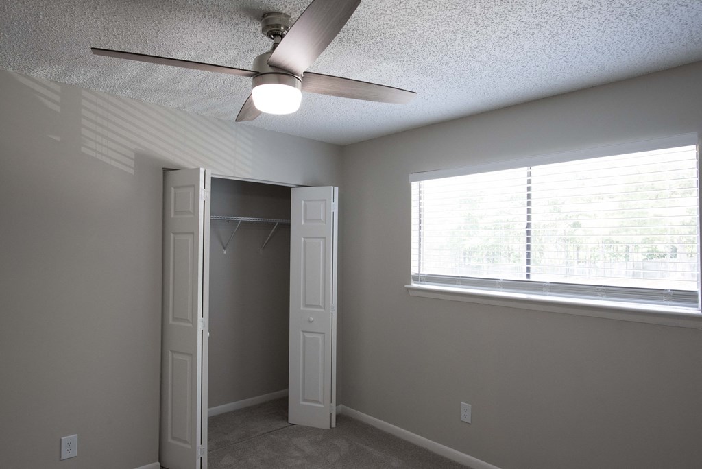 Bedroom With Closet at The Madison Apartments and Townhomes, Lawrenceville, 30044