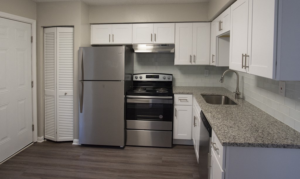 Spacious Kitchen With Pantry Cabinet at The Madison Apartments and Townhomes, Georgia, 30044