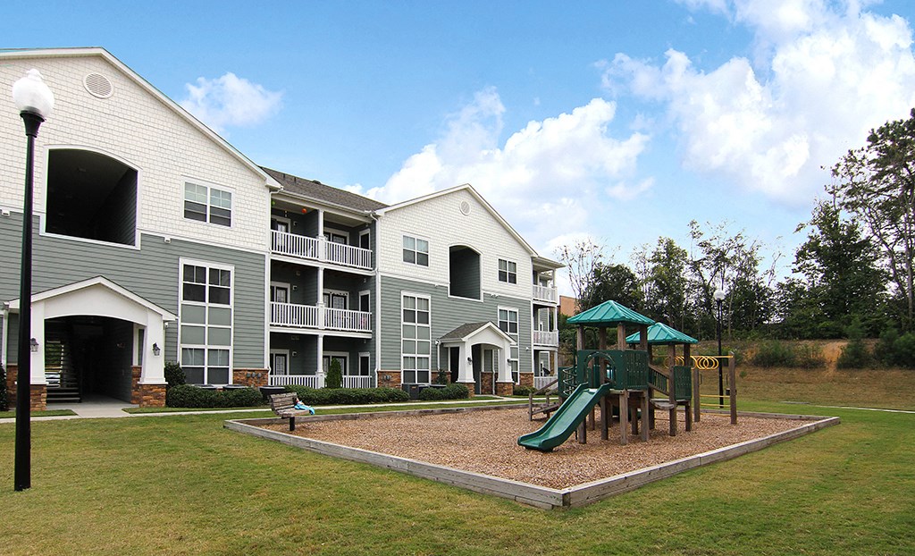 Playground with slide at the Haven at Reed Creek Apartments Martinez, GA