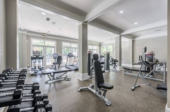 a gym with treadmills and other exercise equipment at Lex at Brier Creek in Morrisville, North Carolina