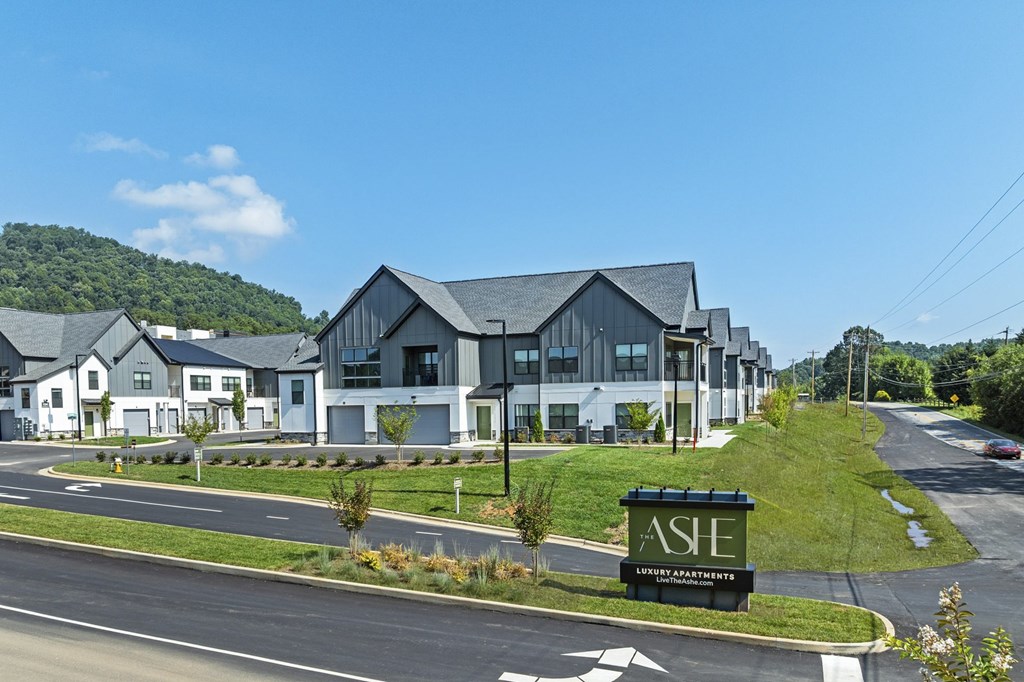 A modern building with the sign "ASIE" in front of it.