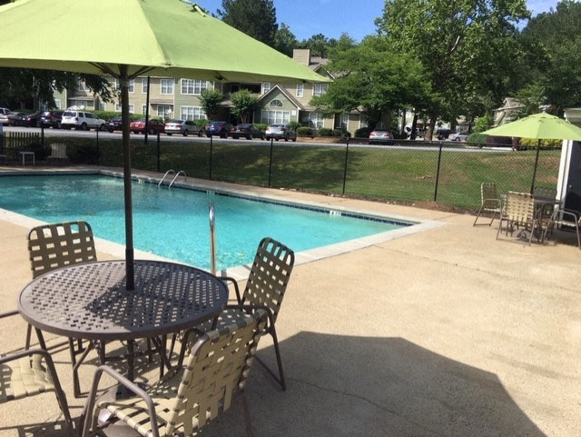 Twin Springs Apartments, Norcross Georgia, beautiful swimming pool with green umbrellas