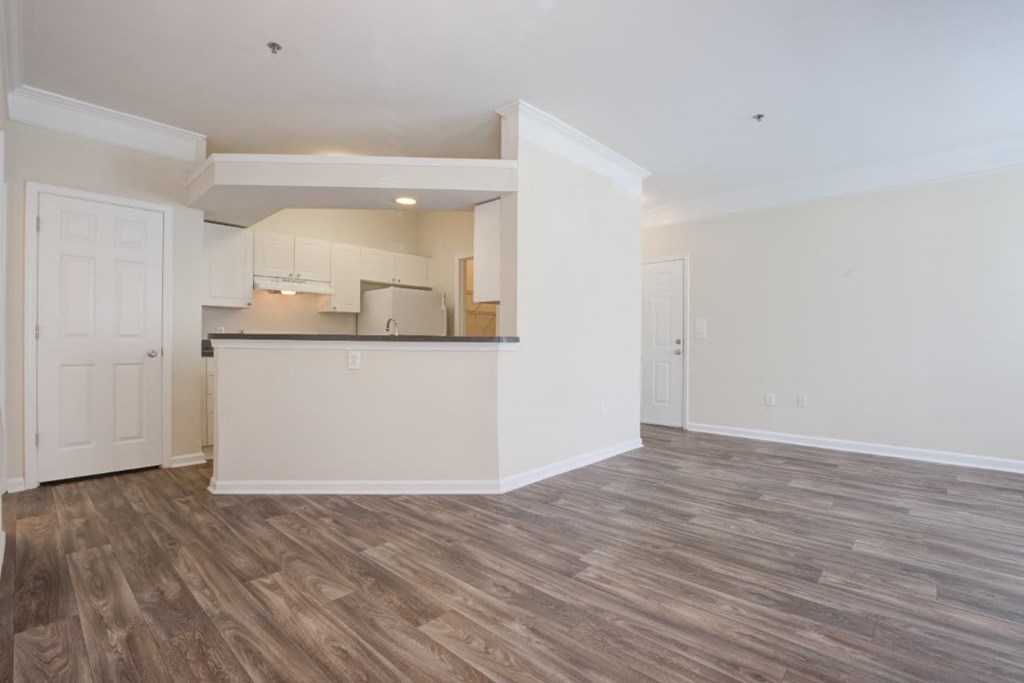 open layout with hardwood-style flooring at Lex at Brier Creek, Morrisville, North Carolina