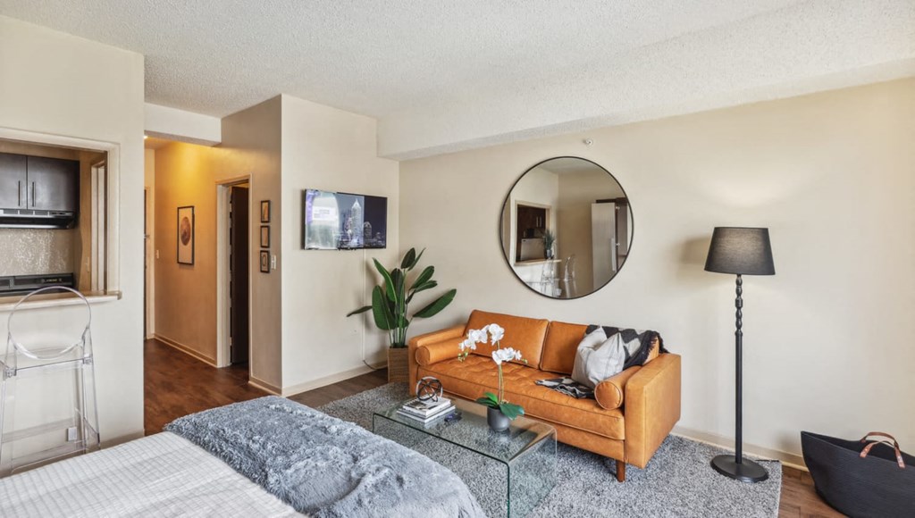 Bedroom with cozy bed at Crest on Peachtree Apartments, Atlanta, GA