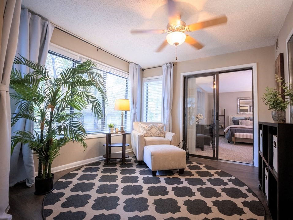 Room with plenty of windows and ceiling fan  at Avenues at Holcomb Bridge, Peachtree Corners, Georgia