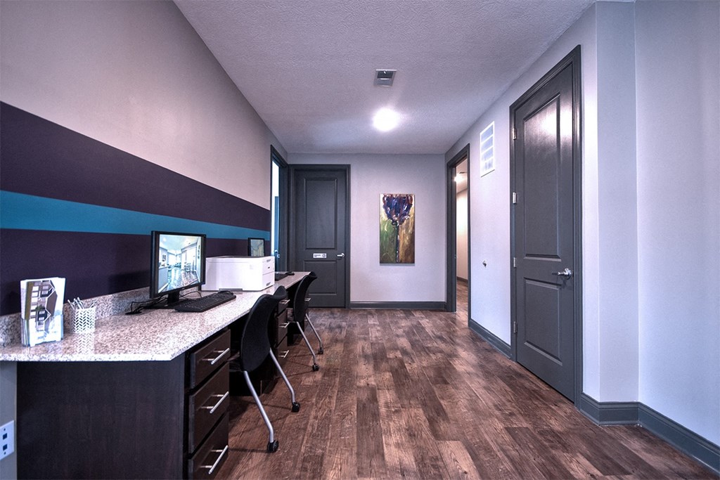 a room with a desk and computer at Park 33, Goshen