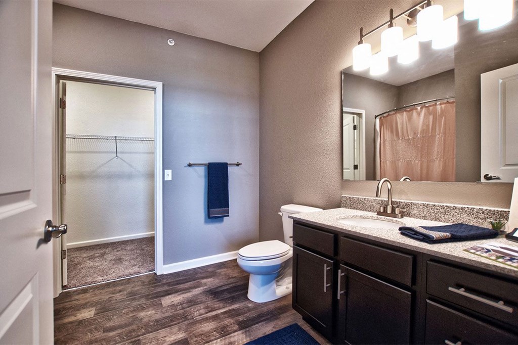 interior bathroom with toilet sink and shower at Park 33, Goshen, IN