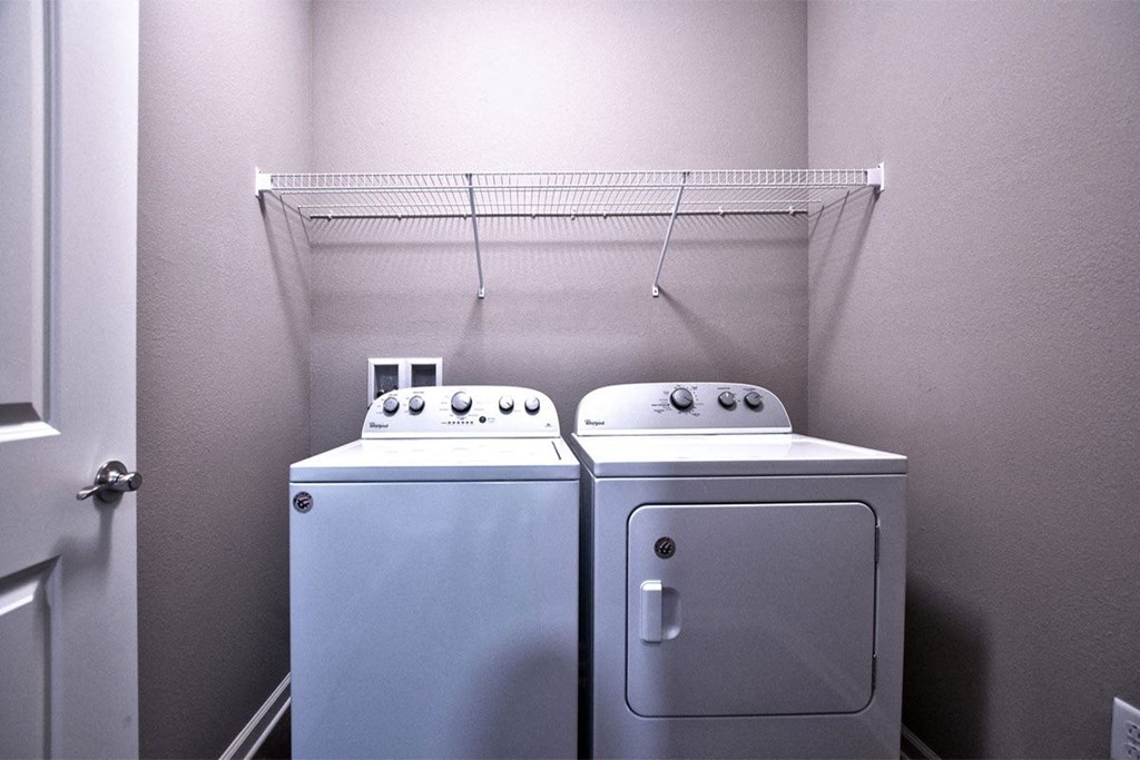 a washer and dryer in a laundry room at Park 33, Goshen