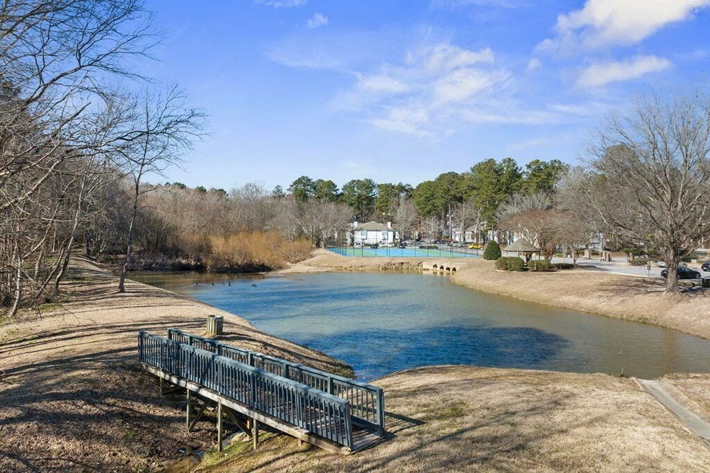 a bridge over a body of water next to a river