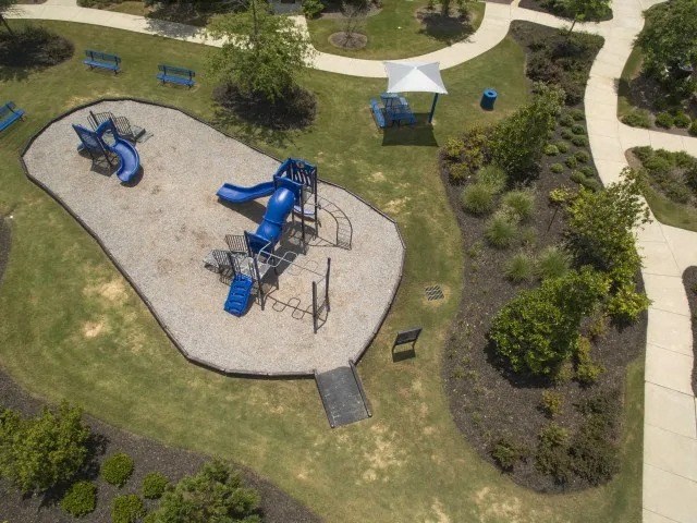an aerial view of the playground at a park at Century HomePlace, Alabama, 36066