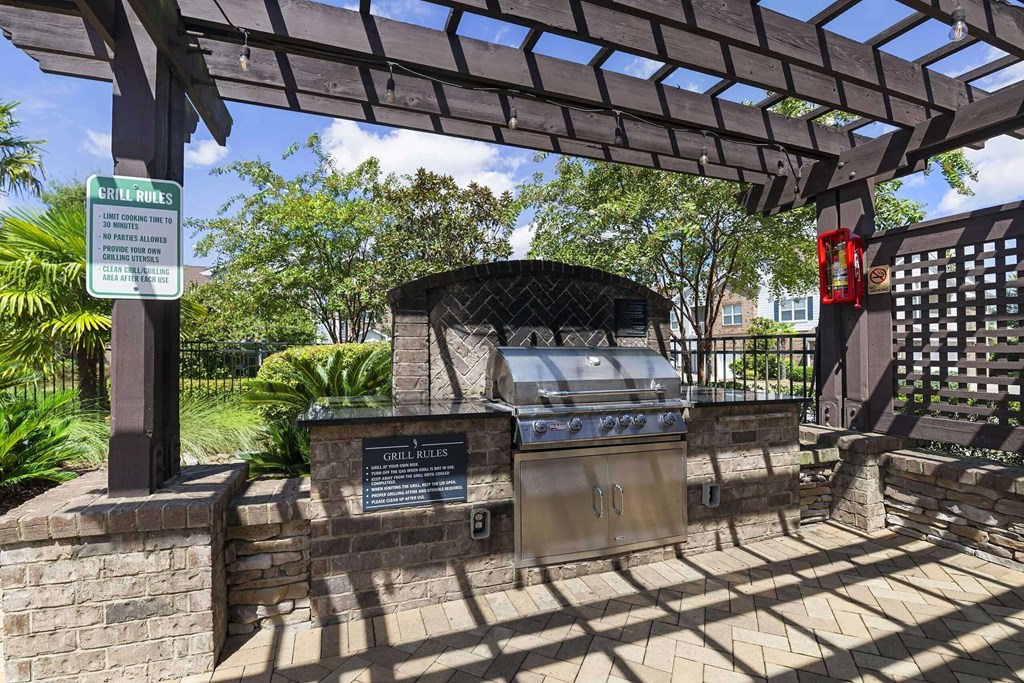 a grill in a park with a wooden pavilion at Century HomePlace, Alabama, 36066