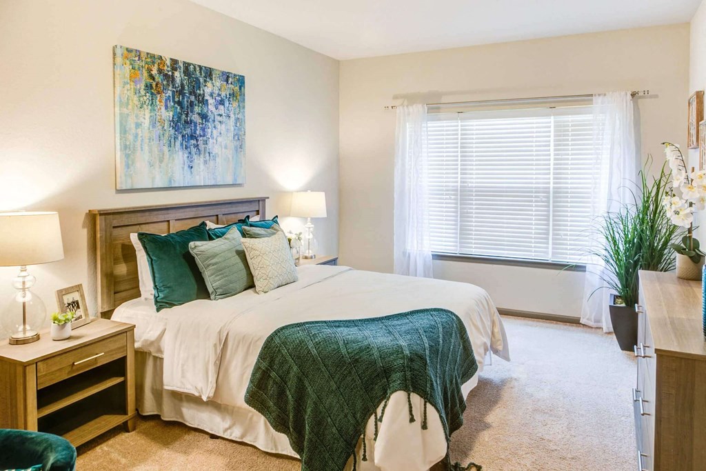 a bedroom with a bed and a window at Century HomePlace, Prattville, AL 36066