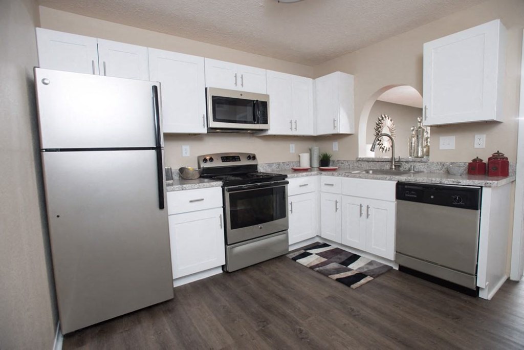 A kitchen with white cabinets and a refrigerator at Ridge Crossings Apartments, Hoover, 35244