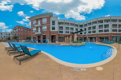 Pool With Relaxing Chairs at Century Cedar Hill, Cedar Hill