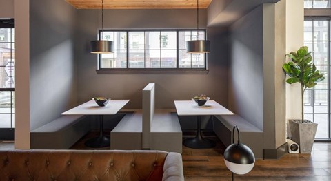 Modern community workspace at Westhouse Flats in Fort Worth, TX with tables, seating, and contemporary finishes.