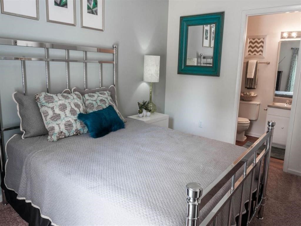 Bedroom with a queen size bed at the Grove at St. Andrews, Columbia, SC