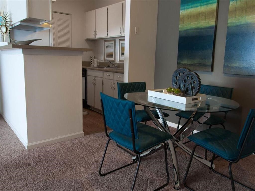 Kitchen and dinning room with table and chairs at the Grove at St. Andrews in Columbia, SC