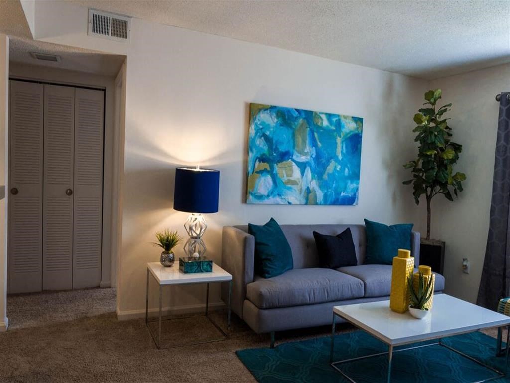 Model living room with art work and furniture at the Grove at St. Andrews, Columbia, SC