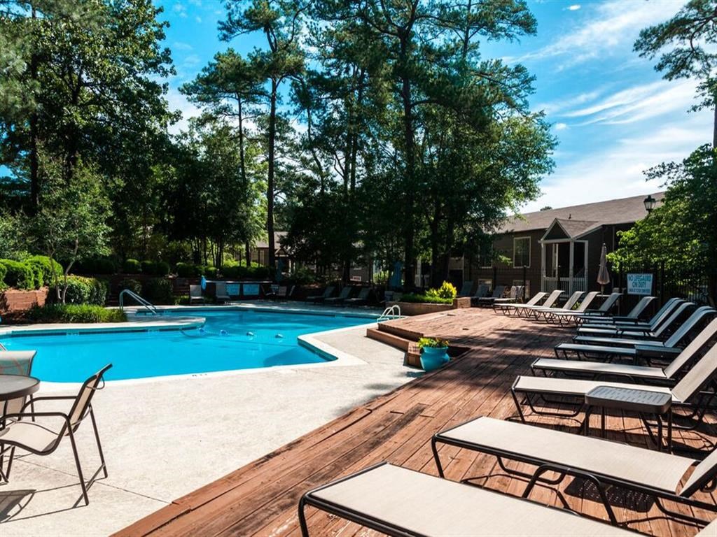 Lounge chairs surrounding the sparkling pool at the Grove at St. Andrews, Columbia, SC