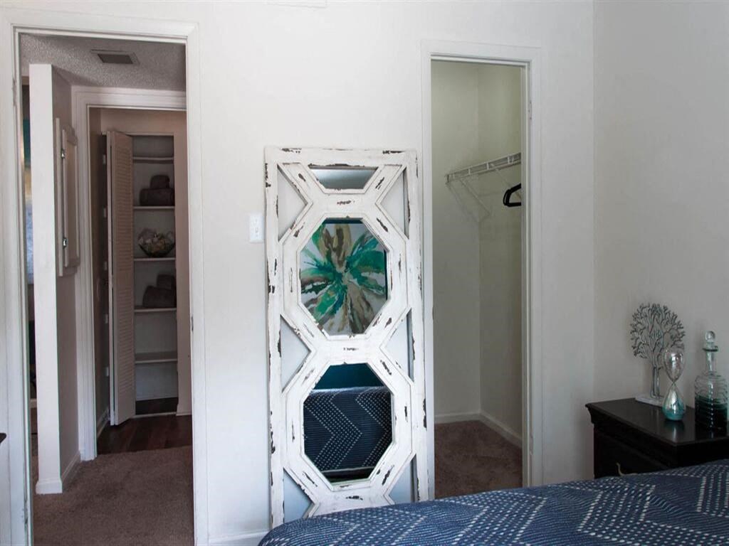 Spacious bedroom with a walk-in closet at the Grove at St. Andrews, Columbia, SC