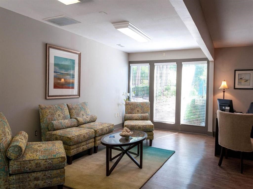 Spacious living space with large windows for natural light at the Grove at St. Andrews, Columbia, SC