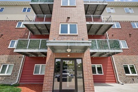 The front of apartment building number 414 is shown.
