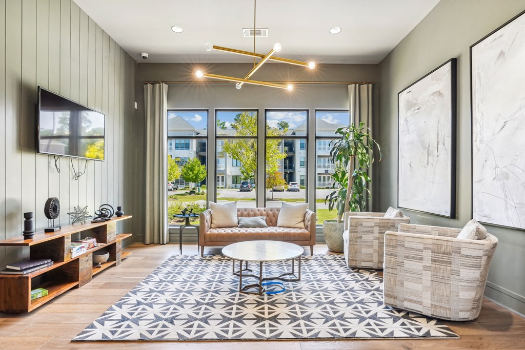 a living room with couches and a coffee table