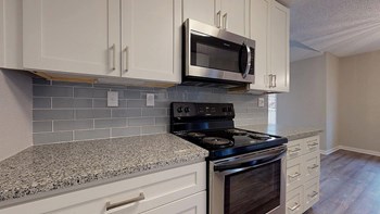 Renovated Kitchen Interiors Renovated Kitchen Interiors at Spalding Vue, Peachtree Corners, GA - Photo Gallery 2