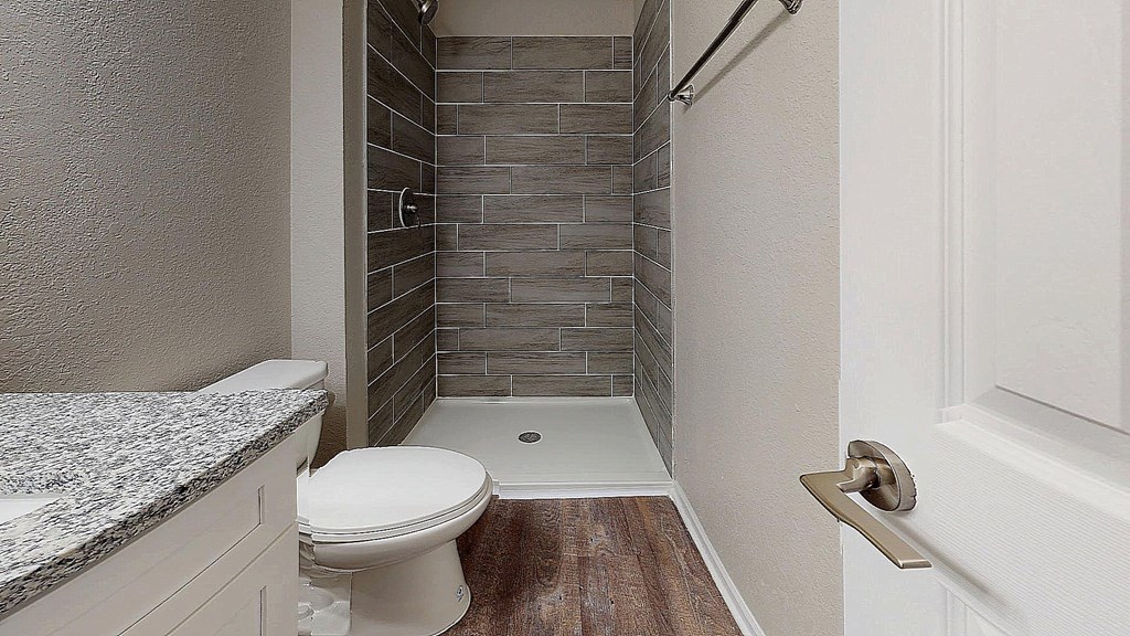 Renovated Bathrooms with Tile Shower Surrounds at Spalding Vue Apartments, Peachtree Corners, Georgia