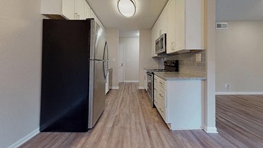 Renovated Galley Style Kitchen  at Spalding Vue Apartments, Peachtree Corners, Georgia