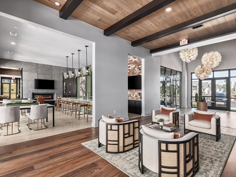 A modern living room with a fireplace and a dining table.